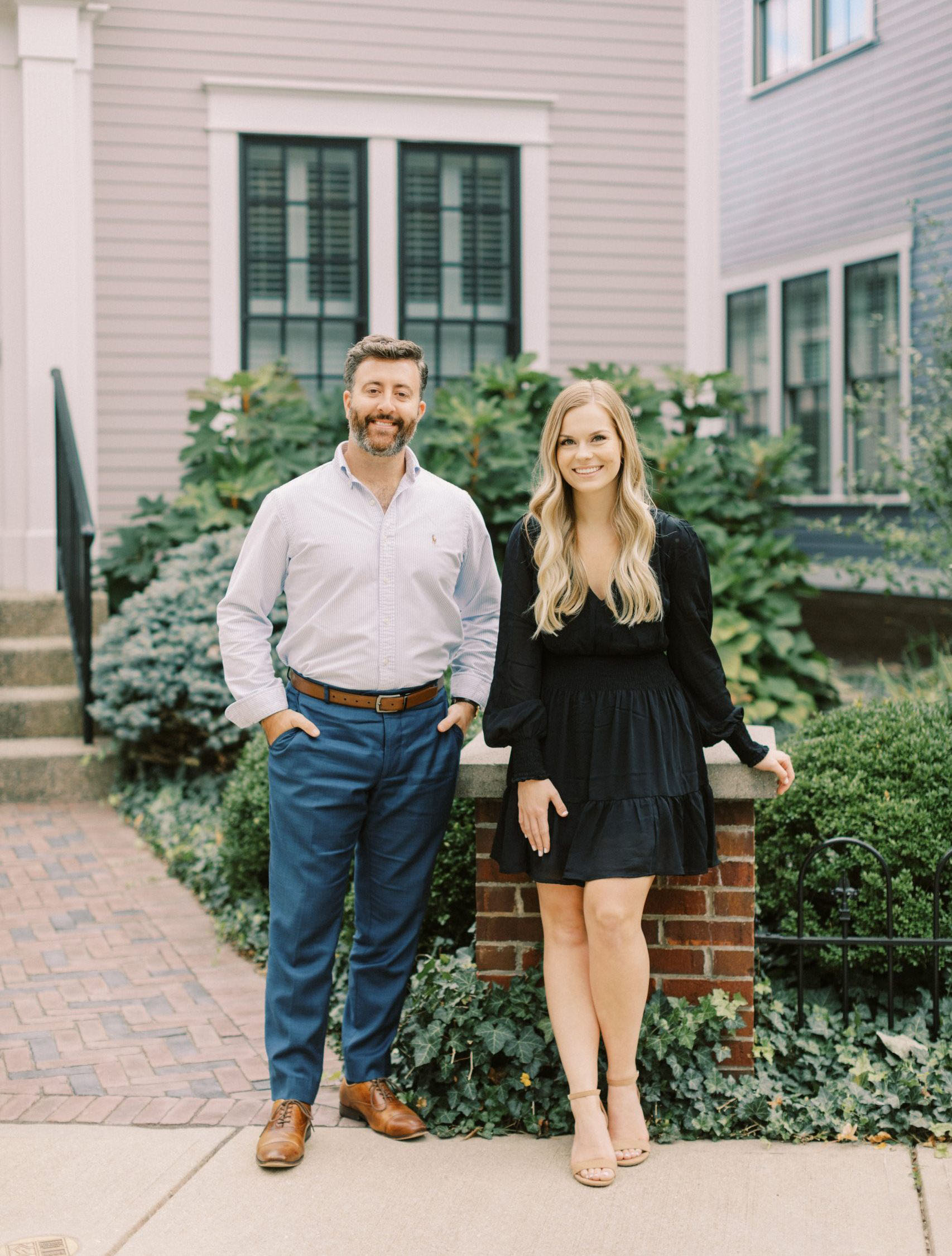 Maggie and Trent in front of home